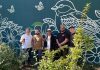 Kinder und Jugendliche gestalten Fassade am Spielplatz Poststraße neu